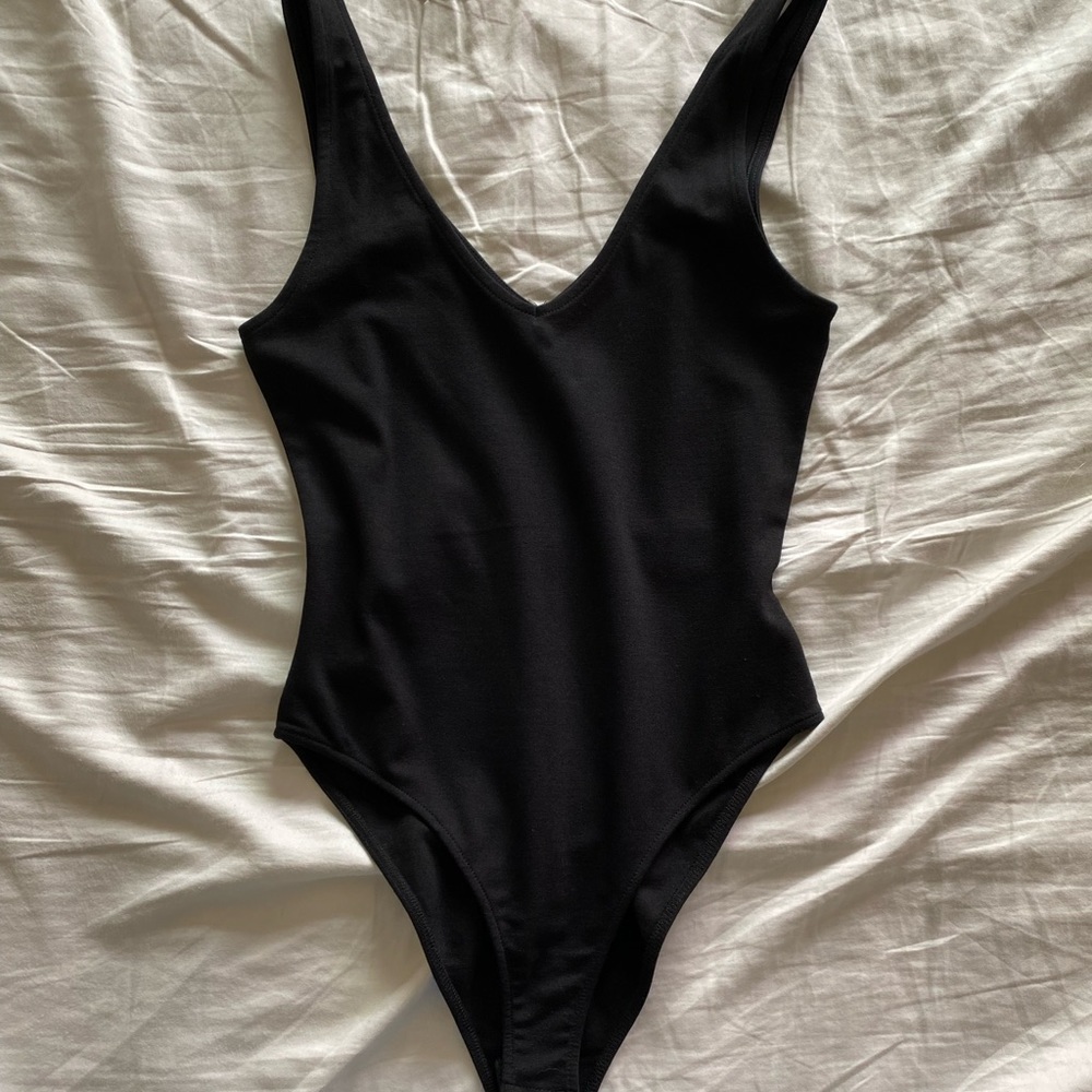 Plain black body suit V neck